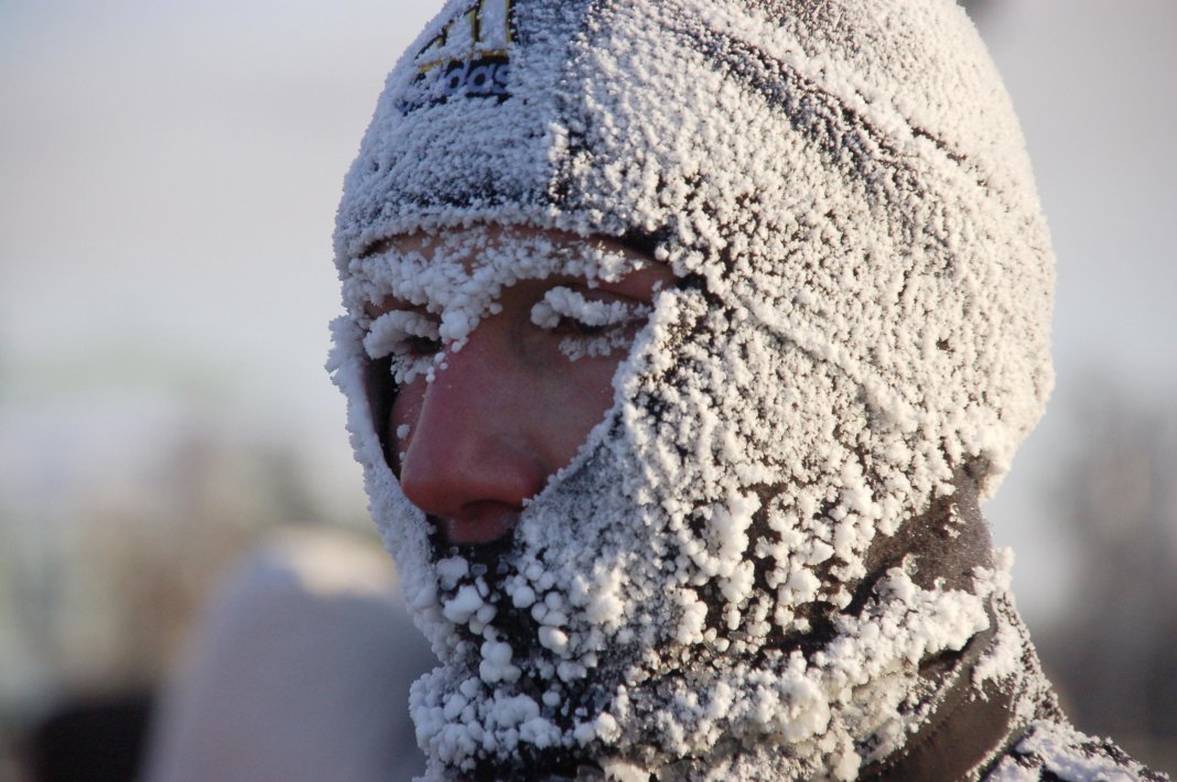 A man covered with hoarfrost is seen after running in Russia's Siberian city of Krasnoyarsk